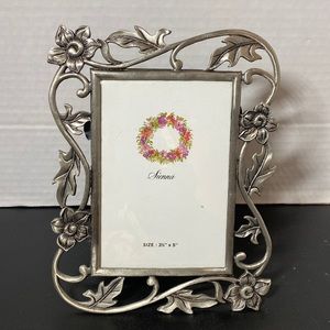 frame. 3.5 x 5” pewter